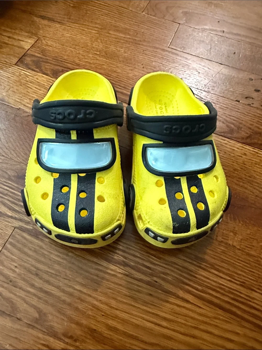 CROCS Kids Yellow and Black Slip-On Clogs with Reflective Accent